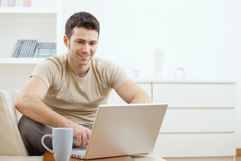 Young man on lap top