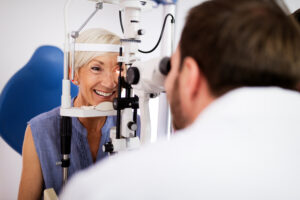 Woman having cataract exam