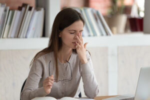 Woman suffering from digital eye strain