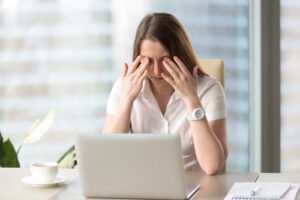 Woman with eye strain and fatigue