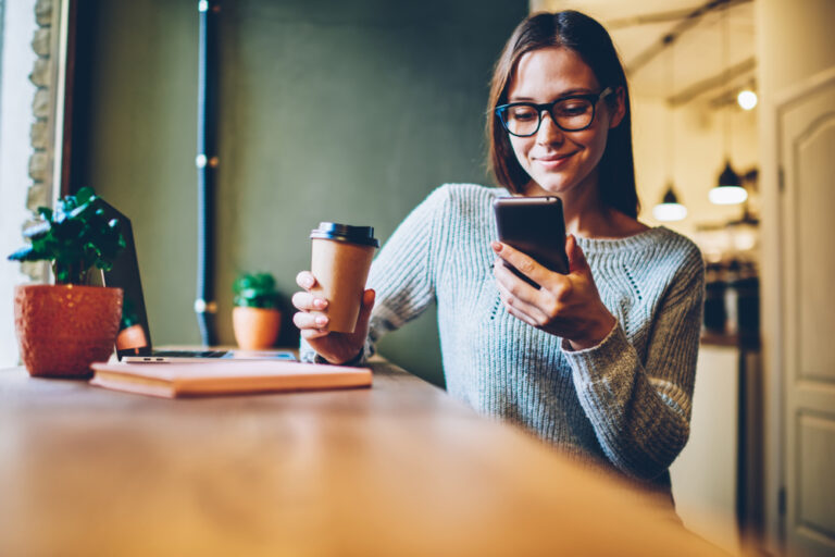 Woman at coffee shop on phone